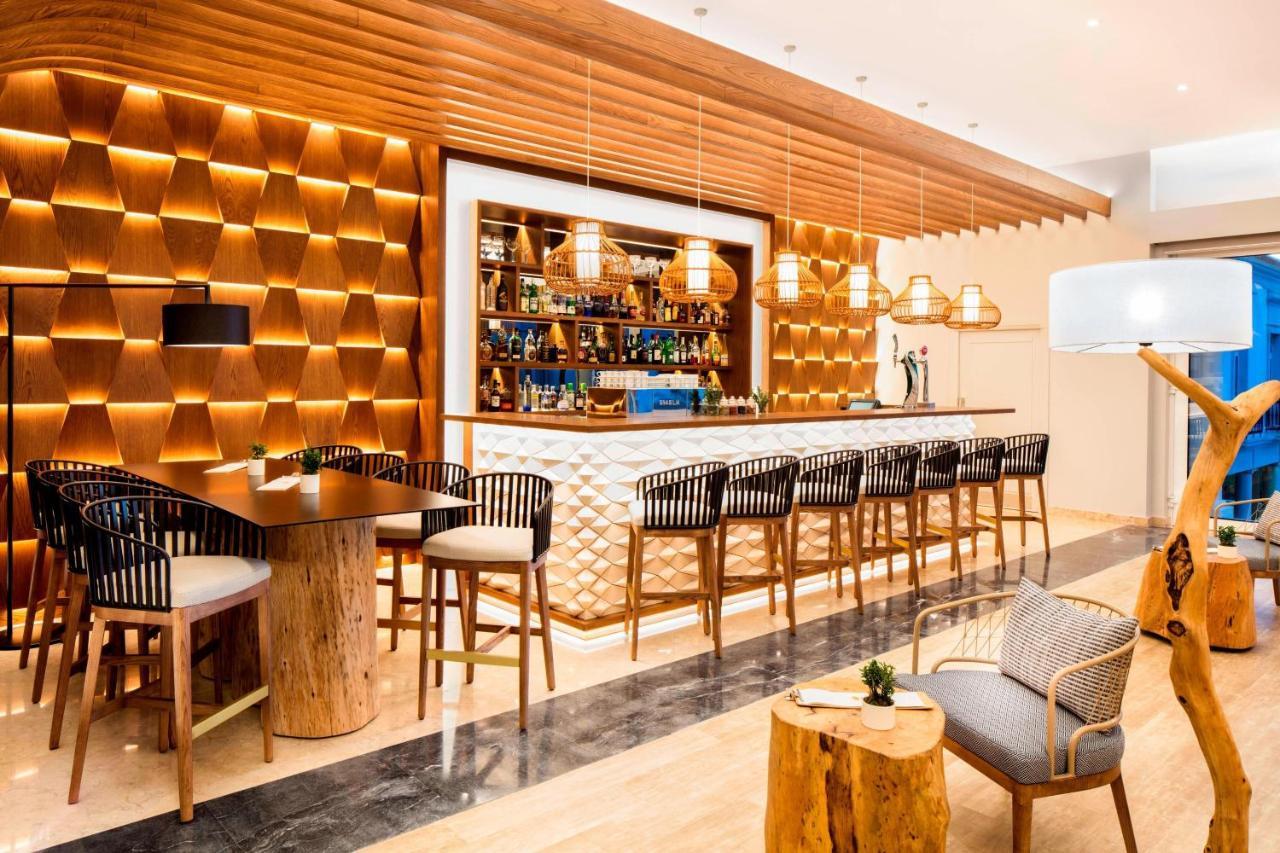منتجع برايا ديل راي ماريوت جولف آند بيتش Praia del Rei المظهر الخارجي الصورة The bar at the hotel